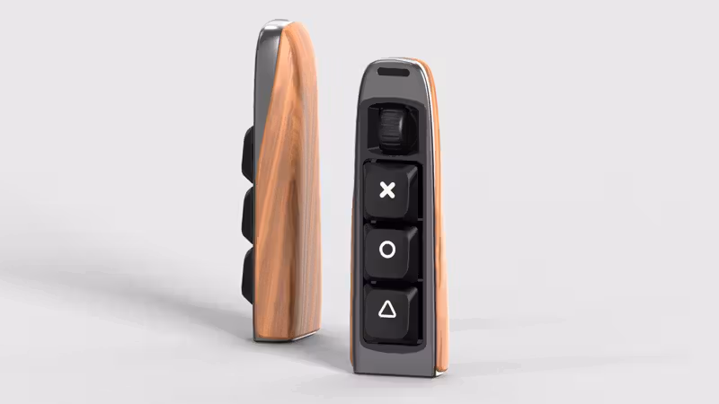 Keychron is experimenting with a mic-equipped mini keeb that lets you chat to your AI agent while it vibe codes, and I have my head in my hands
