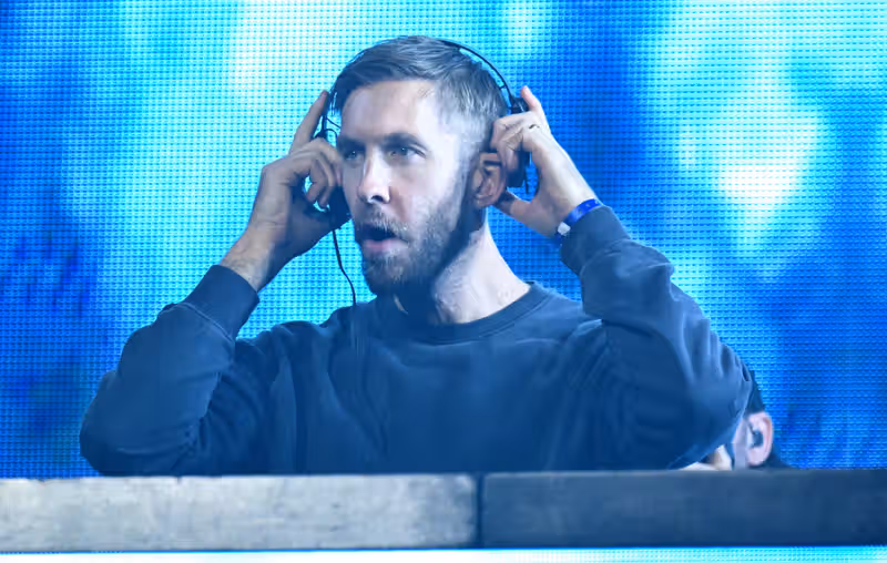 Calvin Harris fan goes viral after being hit with pizza while filming gig on phone